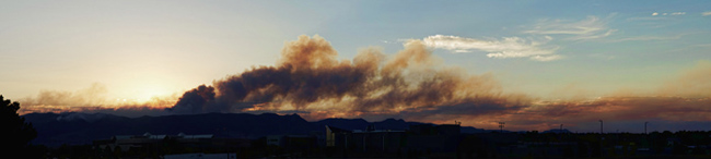 Waldo Canyon Fire as seen from Peterson Air Force Base at sunset 25 June 2012.